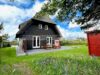 Historische Doppelhaushälfte aus Holz in Kampen - Ansicht mit Garten