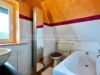 Historische Doppelhaushälfte aus Holz in Kampen - Badezimmer mit Wanne