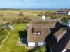 Neuwertige Doppelhaushälfte mit Einzelhauscharakter in traumhafter Lage von Braderup - Luftbild