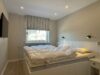 Moderne 2-Zimmer-Wohnung im Herzen von Westerland - Schlafzimmer