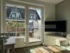 Stilvolle 3 Raum Wohnung in Wenningstedt – mit Terrasse, Sauna und Inselgefühl - Wohnzimmer/Essbereich
