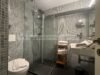 Stilvolle 3 Raum Wohnung in Wenningstedt – mit Terrasse, Sauna und Inselgefühl - Duschbad