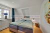Doppelhaushälfte mit Dünenblick in List – stilvoll modernisiert und voller Charme - Schlafzimmer
