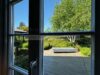 "Am Königshafen" - Traumhaftes Wohnhaus mit einer genehmigten Ferienwohnung und einer Wohnung - Blick in den Garten