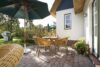 Traditionsreiches Reetdachhotel mit modernem Ausbau und engagierter Betreiberpersönlichkeit mit internationaler Erfahrung - Terrasse