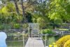 Reetanwesen im englischen Landhausstil mit Teich in Deichlage von Archsum - Garten